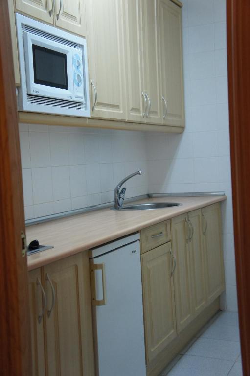 Apartamentos Fidalgo Sandiniés Habitación foto